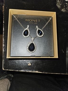 Monet Silver Necklace and Earrings with Deep Blue Teardrop Stones